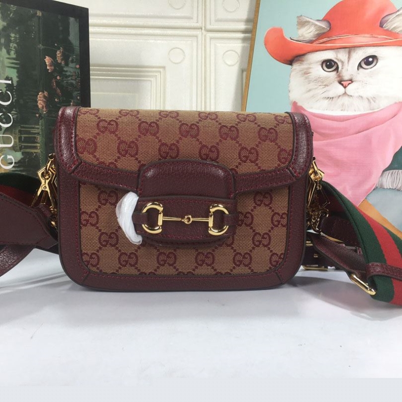 G*u*i satchel bags